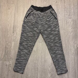 Textured pants with detailed edging